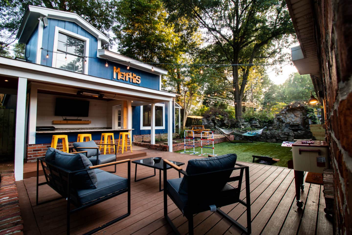Open living and dining area at the East Memphis Game House