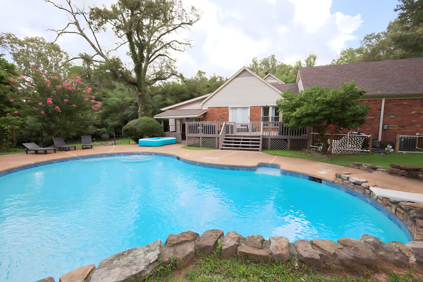 Private pool and backyard at the Collierville pool and game home